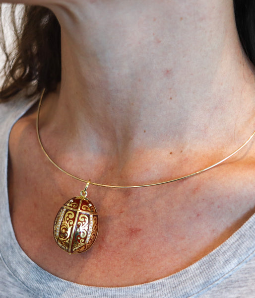 SECRET BOX In The Shape of An Enameled Egg Pendant In 18Kt Gold With Diamonds