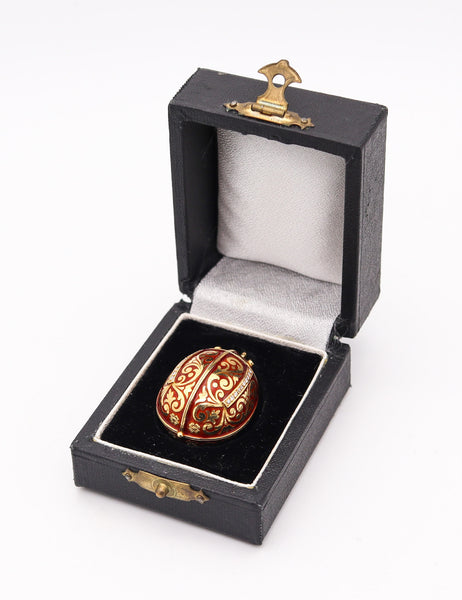 SECRET BOX In The Shape of An Enameled Egg Pendant In 18Kt Gold With Diamonds
