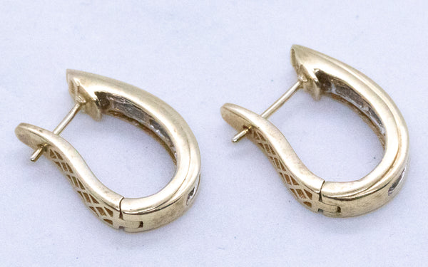 BAGUETTE DIAMONDS LONG HUGGIE 14 KT EARRINGS