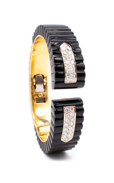 EUROPEAN MODERNIST 18 KT BRACELET WITH CARVED ONYX AND 2.10 Cts OF DIAMONDS