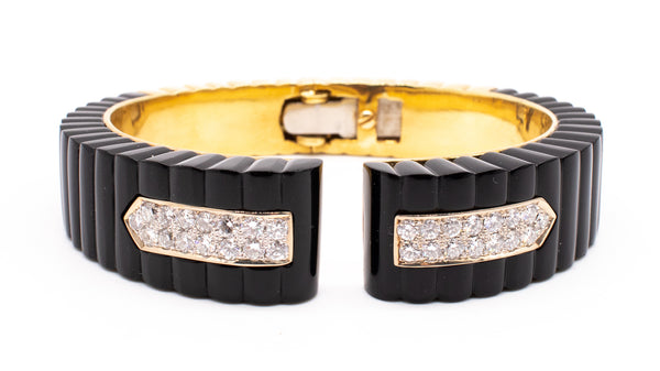 EUROPEAN MODERNIST 18 KT BRACELET WITH CARVED ONYX AND 2.10 Cts OF DIAMONDS