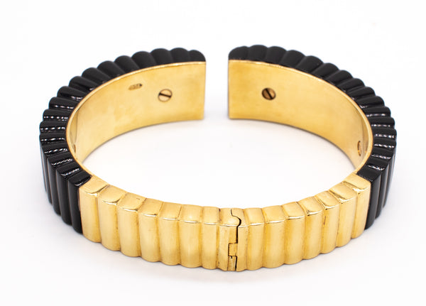 EUROPEAN MODERNIST 18 KT BRACELET WITH CARVED ONYX AND 2.10 Cts OF DIAMONDS