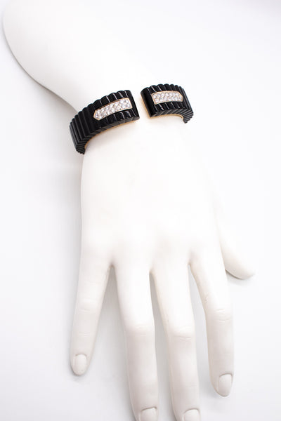 EUROPEAN MODERNIST 18 KT BRACELET WITH CARVED ONYX AND 2.10 Cts OF DIAMONDS