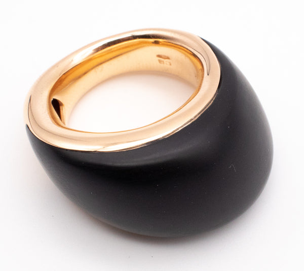 CARL BUCHERER SWISS 18 KT ROSE GOLD MODERNIST RING WITH CARVED EBONY