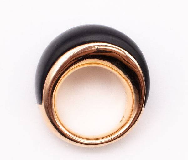 CARL BUCHERER SWISS 18 KT ROSE GOLD MODERNIST RING WITH CARVED EBONY