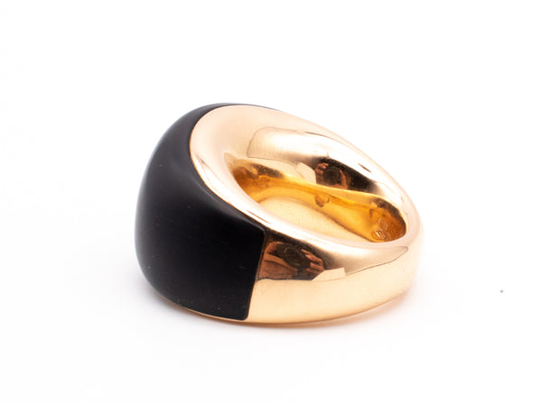 CARL BUCHERER SWISS 18 KT ROSE GOLD MODERNIST RING WITH CARVED EBONY
