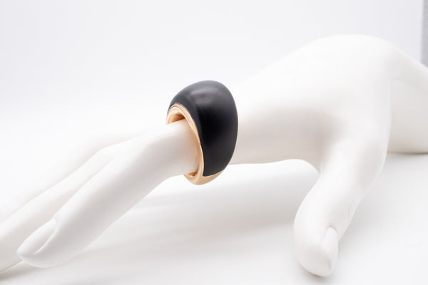 CARL BUCHERER SWISS 18 KT ROSE GOLD MODERNIST RING WITH CARVED EBONY