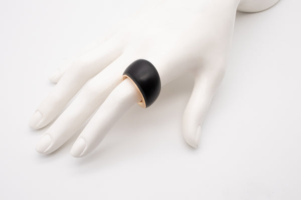 CARL BUCHERER SWISS 18 KT ROSE GOLD MODERNIST RING WITH CARVED EBONY