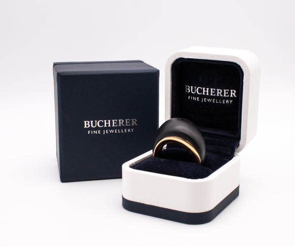 CARL BUCHERER SWISS 18 KT ROSE GOLD MODERNIST RING WITH CARVED EBONY