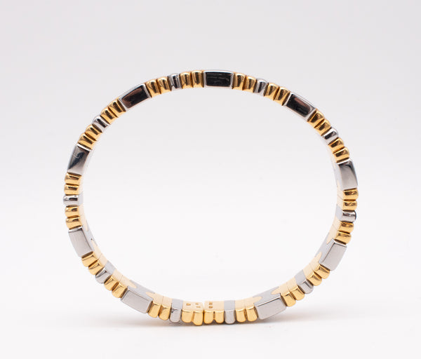 BVLGARI, ITALY TWO TONES PARENTESI BRACELET CUFF IN 18 KT GOLD & STEEL