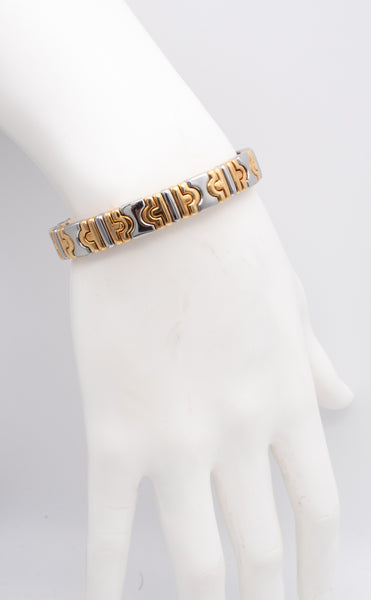 BVLGARI, ITALY TWO TONES PARENTESI BRACELET CUFF IN 18 KT GOLD & STEEL