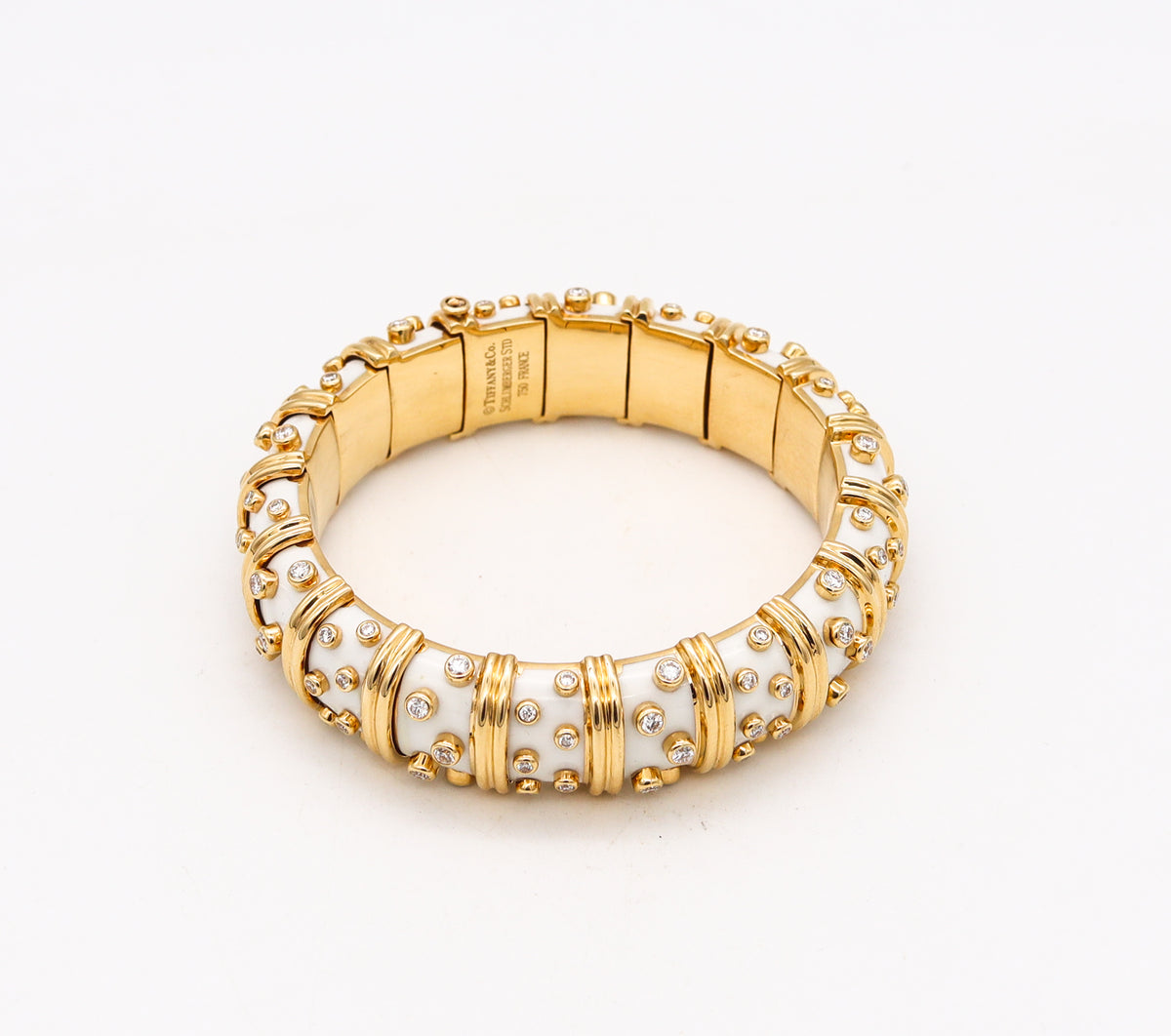 SCHLUMBERGER FOR TIFFANY & CO., GOLD, ENAMEL AND DIAMOND BANGLE-BRACELET, Important Jewels, 2020