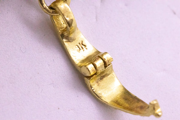 MASSIVE 18 KT GOLD SAUTOIR WITH A JEWELED ELEPHANT PENDANT