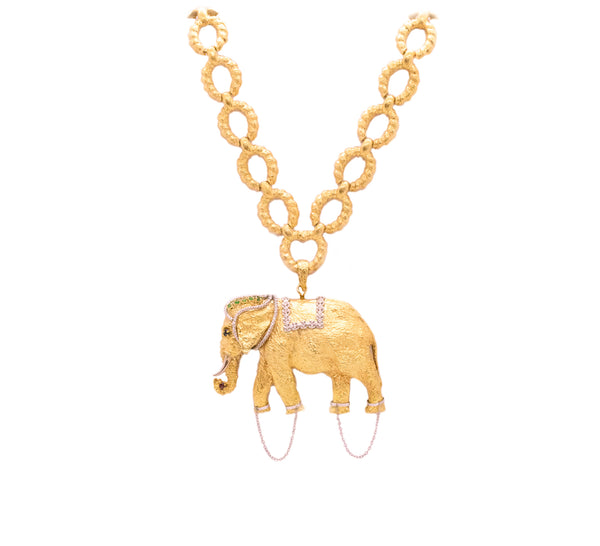 MASSIVE 18 KT GOLD SAUTOIR WITH A JEWELED ELEPHANT PENDANT