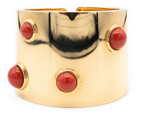 FRED JOAILLIER, PARIS 18 KT GOLD MASSIVE MODERN ARM CUFF WITH FOUR RED CORAL