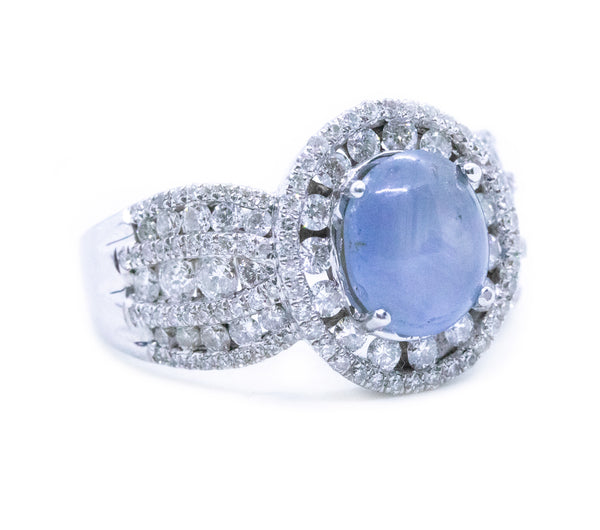 CLASSICAL 18 KT RING WITH 4.95 Ctw DIAMONDS & STAR SAPPHIRE