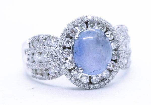 CLASSICAL 18 KT RING WITH 4.95 Ctw DIAMONDS & STAR SAPPHIRE