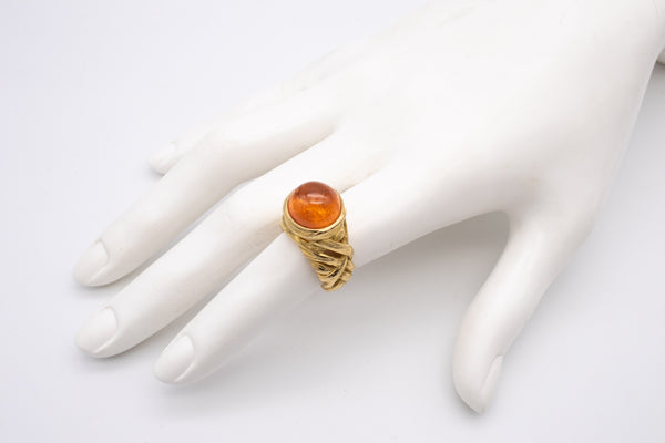 ANGELA CUMMINGS 18 KT GOLD RING WITH A 11.5 Cts MANDARIN GARNET