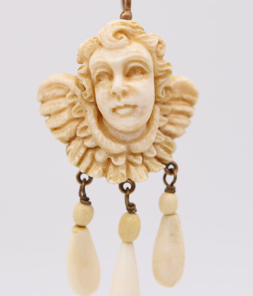 French 1820 Pair Of Dangle Drop Earrings In 18Kt Gold With Cherubs Carvings