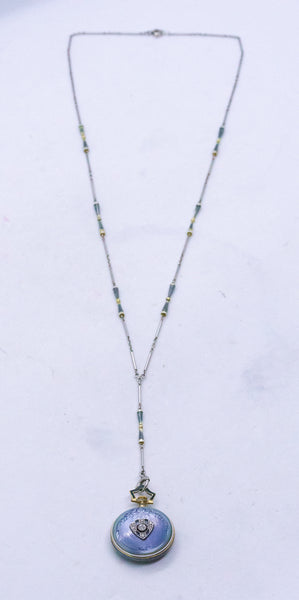 ART DECO MARCUS & Co. PLATINUM AND GOLD ENAMELED WATCH PENDANT LARIAT