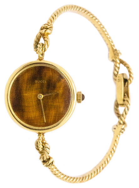GUCCI 1960'S RARE RETRO 18 KT WRISTWATCH WITH GOLDEN TIGER EYE DIAL