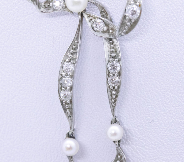 PLATINUM 1910 EDWARDIAN LARIAT WITH DIAMONDS AND NATURAL PEARLS