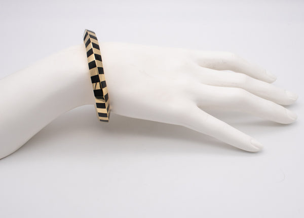 ANGELA CUMMINGS FOR TIFFANY & CO. 18 KT GEOMETRIC TWISTED CUFF WITH BLACK JADE