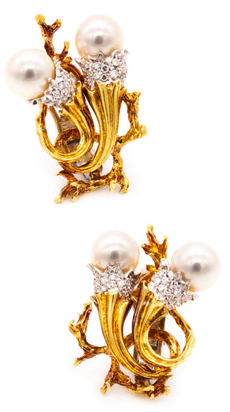 *Torchiere earrings in 18 kt gold and platinum with vs diamonds & white pearls