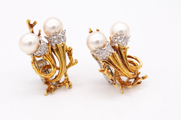 *Torchiere earrings in 18 kt gold and platinum with vs diamonds & white pearls