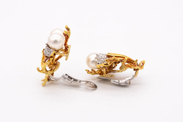 *Torchiere earrings in 18 kt gold and platinum with vs diamonds & white pearls