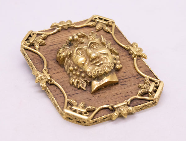 ALDO CIPULLO 1960 PENDANT BROOCH OF BACCHUS IN 18 KT AND WOOD