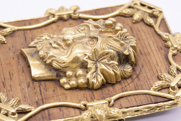 ALDO CIPULLO 1960 PENDANT BROOCH OF BACCHUS IN 18 KT AND WOOD