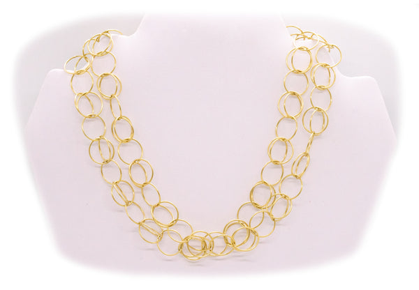 MODERNIST VINTAGE ITALIAN 18 KT GOLD SAUTOIR NECKLACE WITH GEOMETRIC CIRCLES