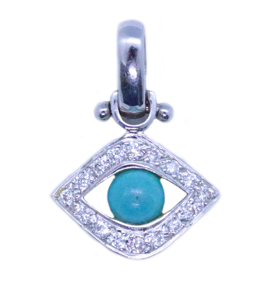EYE OF HORUS CHARM 18 KT WITH DIAMONDS AND TURQUOISE