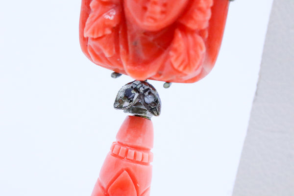 ANTIQUE CORAL CARVINGS MOUNTED IN LONG EARRINGS