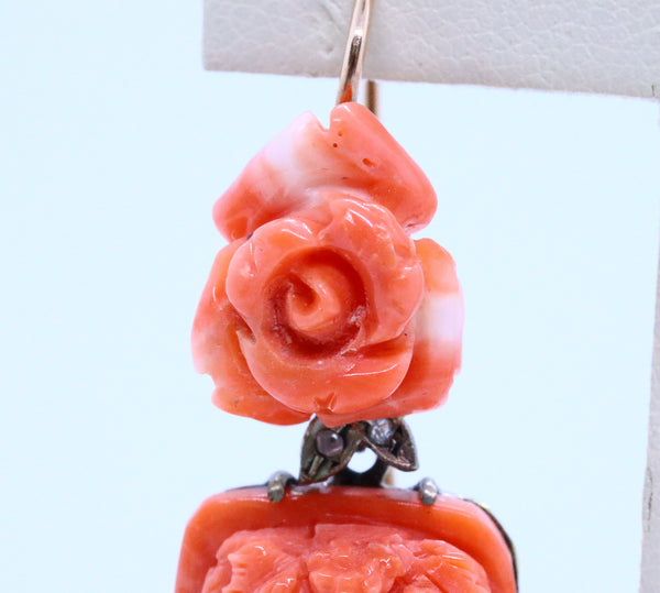 ANTIQUE CORAL CARVINGS MOUNTED IN LONG EARRINGS