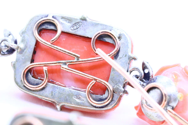 ANTIQUE CORAL CARVINGS MOUNTED IN LONG EARRINGS