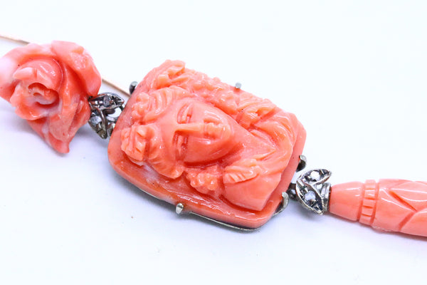 ANTIQUE CORAL CARVINGS MOUNTED IN LONG EARRINGS
