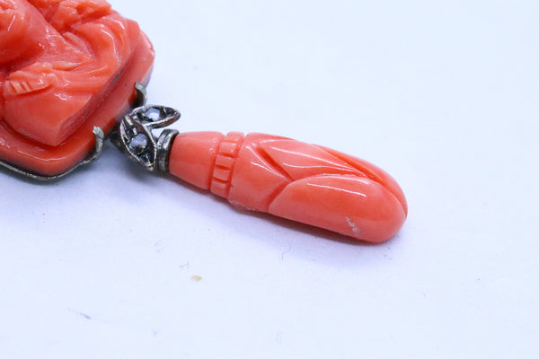 ANTIQUE CORAL CARVINGS MOUNTED IN LONG EARRINGS