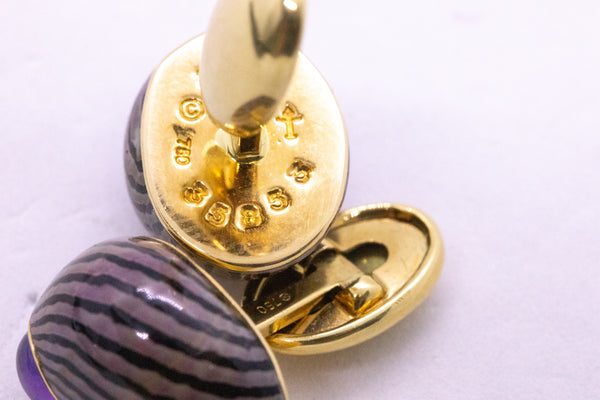 SEAMAN SCHEPPS, TRIANON 18 KT GOLD CUFFLINKS SHELL WITH AMETHYST