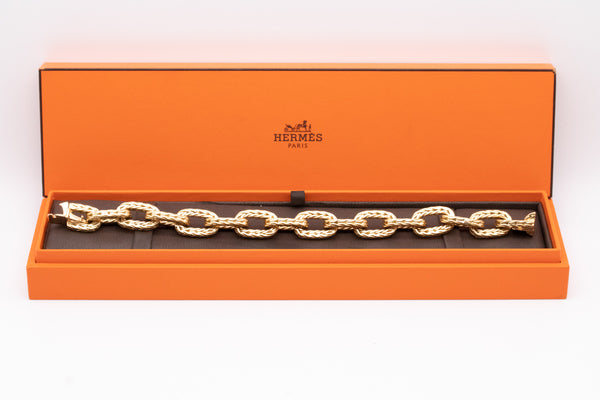 HERMES PARIS 1960 BRAIDED BRACELET IN 18 KT BY GEORGE L'ENFANT