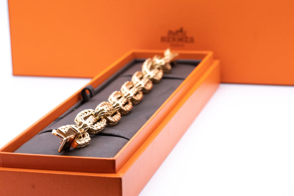 HERMES PARIS 1960 BRAIDED BRACELET IN 18 KT BY GEORGE L'ENFANT