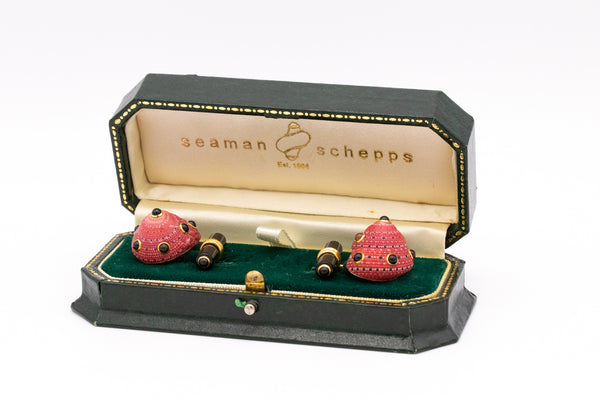 SEAMAN SCHEPPS, TRIANON 18 KT GOLD SHELL CUFFLINKS WITH GEMSTONES