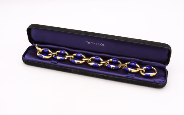 TIFFANY & CO. 1980 ANGELA CUMMINGS 18 KT GOLD MARINER BRACELET WITH LAPIS LAZULI