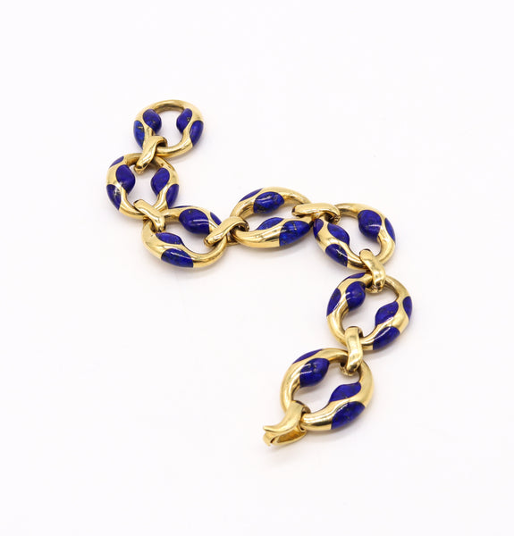 TIFFANY & CO. 1980 ANGELA CUMMINGS 18 KT GOLD MARINER BRACELET WITH LAPIS LAZULI