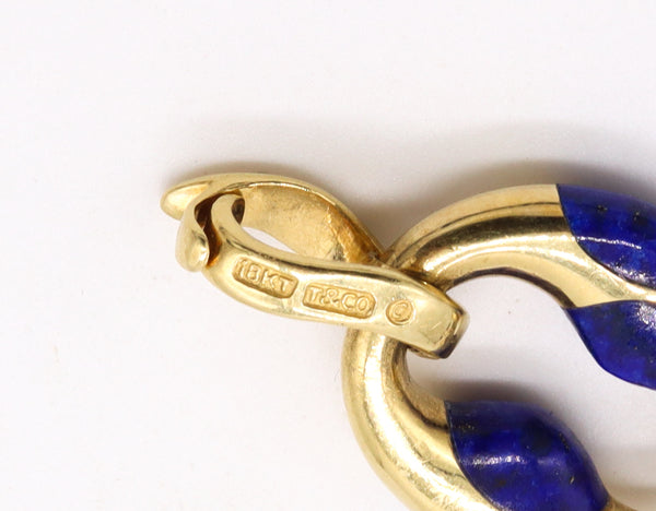 TIFFANY & CO. 1980 ANGELA CUMMINGS 18 KT GOLD MARINER BRACELET WITH LAPIS LAZULI