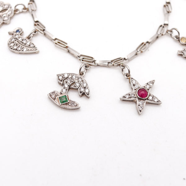 Art Deco 1930 Eleven Charms Bracelet In Platinum Enamel With 3.48 Ctw In Diamonds And Gems