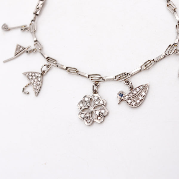 Art Deco 1930 Eleven Charms Bracelet In Platinum Enamel With 3.48 Ctw In Diamonds And Gems