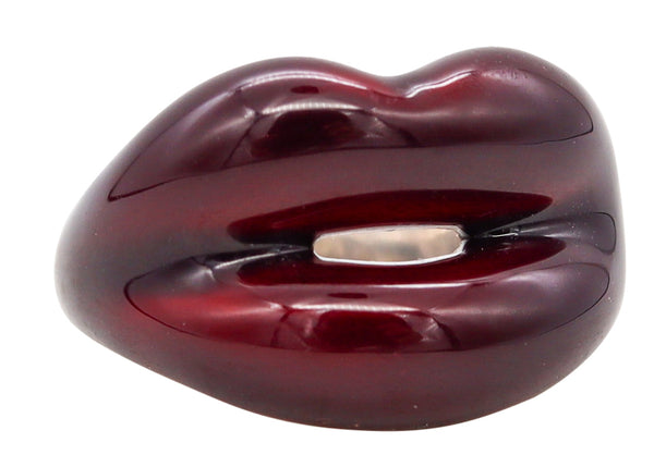 *Solange Azagury-Partridge British Hot-lips ring in .925 sterling silver with metallic Red Enamel
