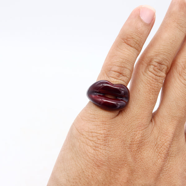 *Solange Azagury-Partridge British Hot-lips ring in .925 sterling silver with metallic Red Enamel